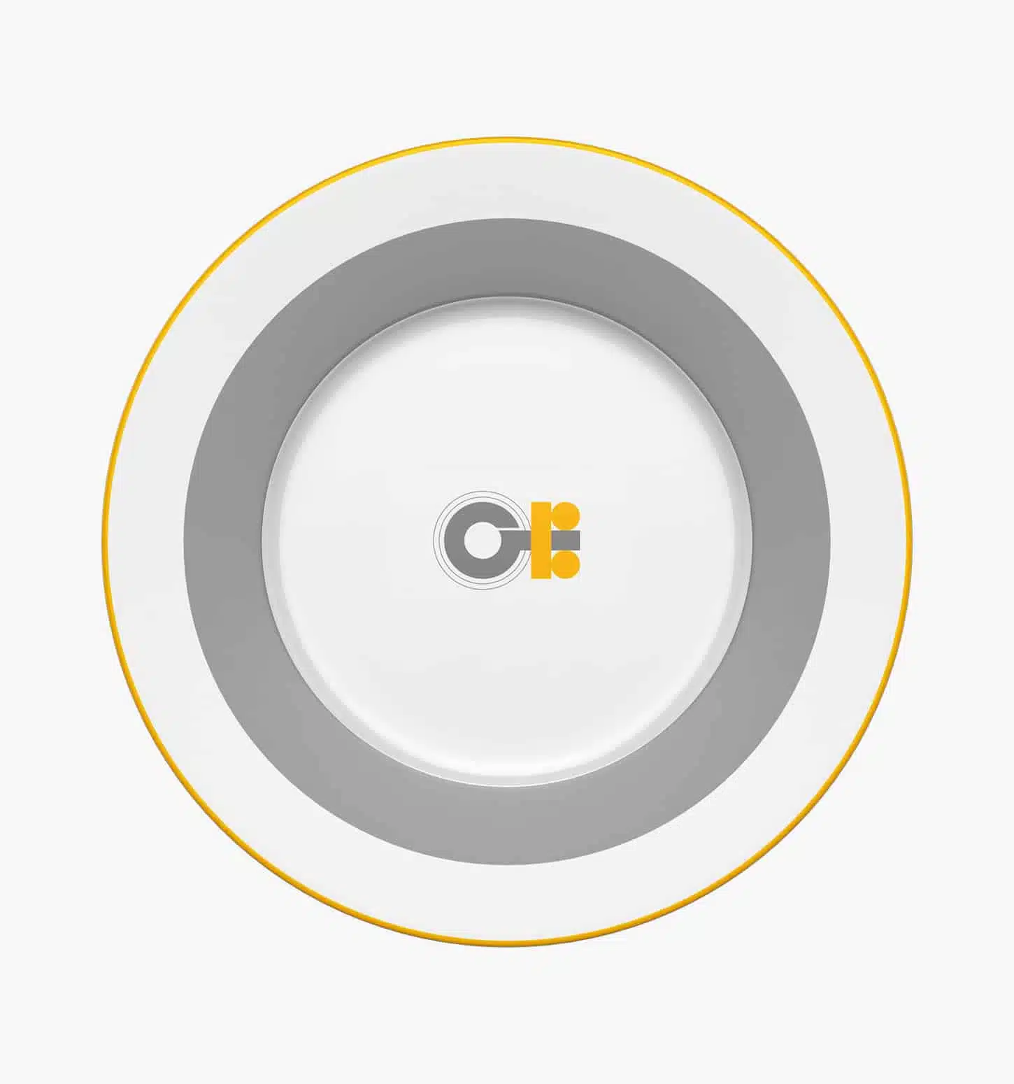 Dinner plate in porcelain from the Monogrammes collection by Puiforcat on a light background.